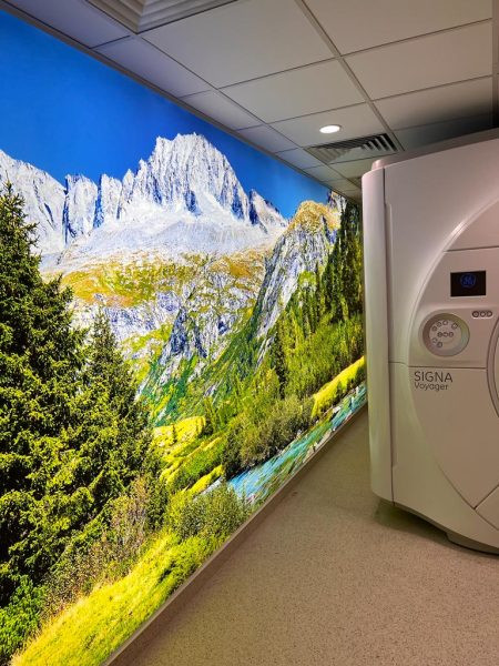 MRI room equipped with projector for enhanced patient experience